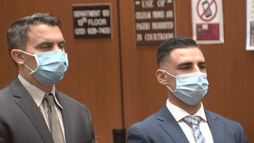 Matthew Concannon, left, and Anthony Chavez, right, at a 2023 court appearance after they were indicted on a manslaughter charge for a 2018 on-duty shooting.